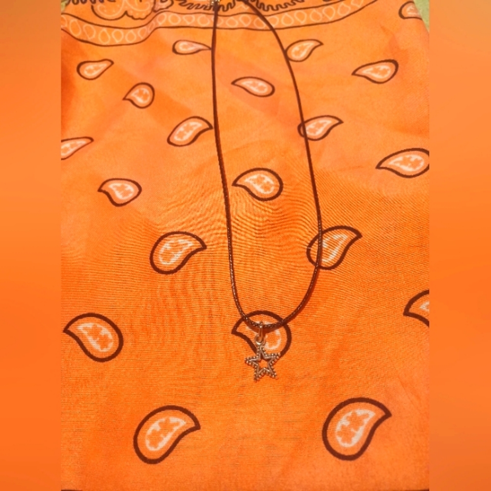 Black cord necklace with star charm